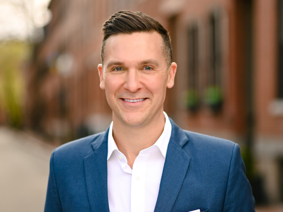 Man in business attire posing for a professional headshot